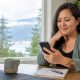 A British Columbia resident reviewing healthcare contact details at home while waiting for a family doctor