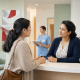 A patient speaking with a healthcare navigator at an Ontario community health centre