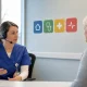 A triage nurse helping a patient choose the appropriate level of unscheduled care